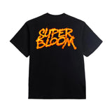 Flame Still Burns Logo Tee in - Black